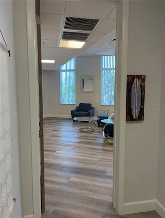 a room with furniture and stairs