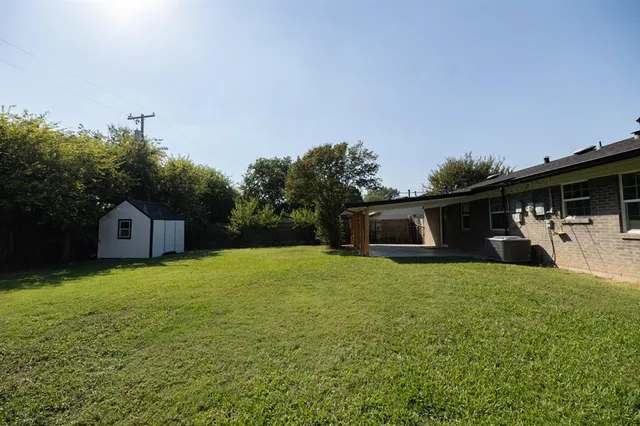 a house view with a garden space