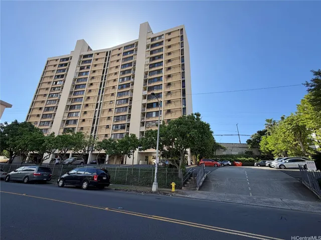 a front view of a building with street view