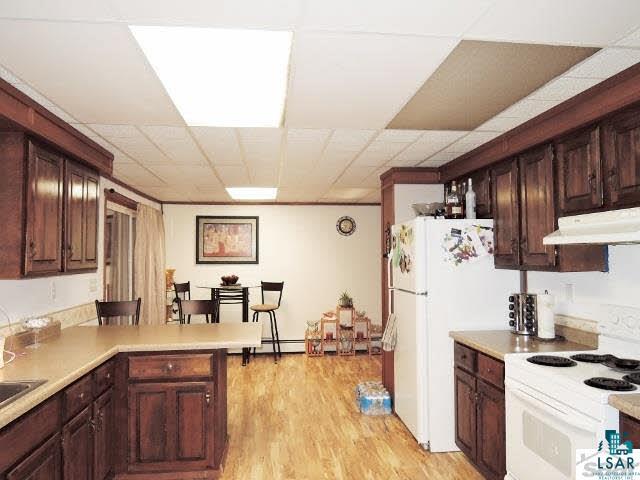9049 Biller Loop Solon Springs, WI 54873 - Photo 5 of 24 Newer laminate floor