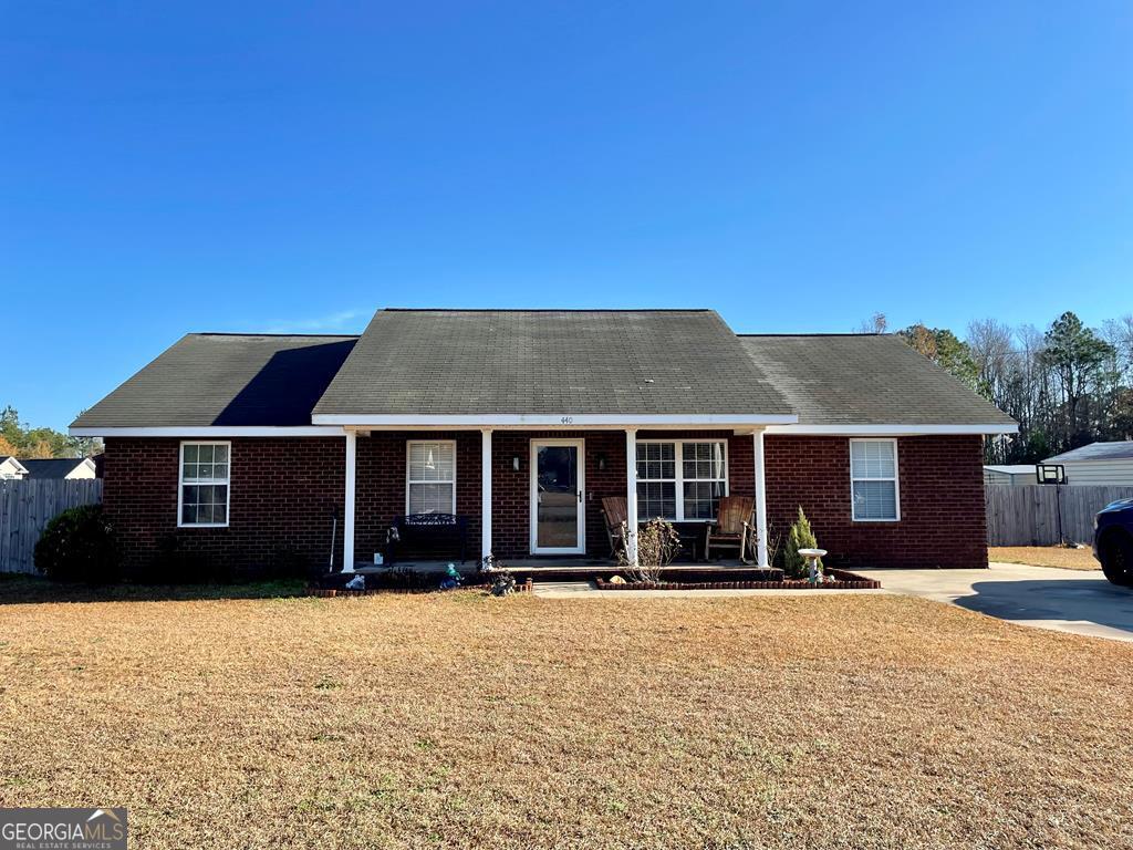 440 Wilkinson Road Ludowici, GA 31316 - Photo 1 of 1 front view of a house with a yard