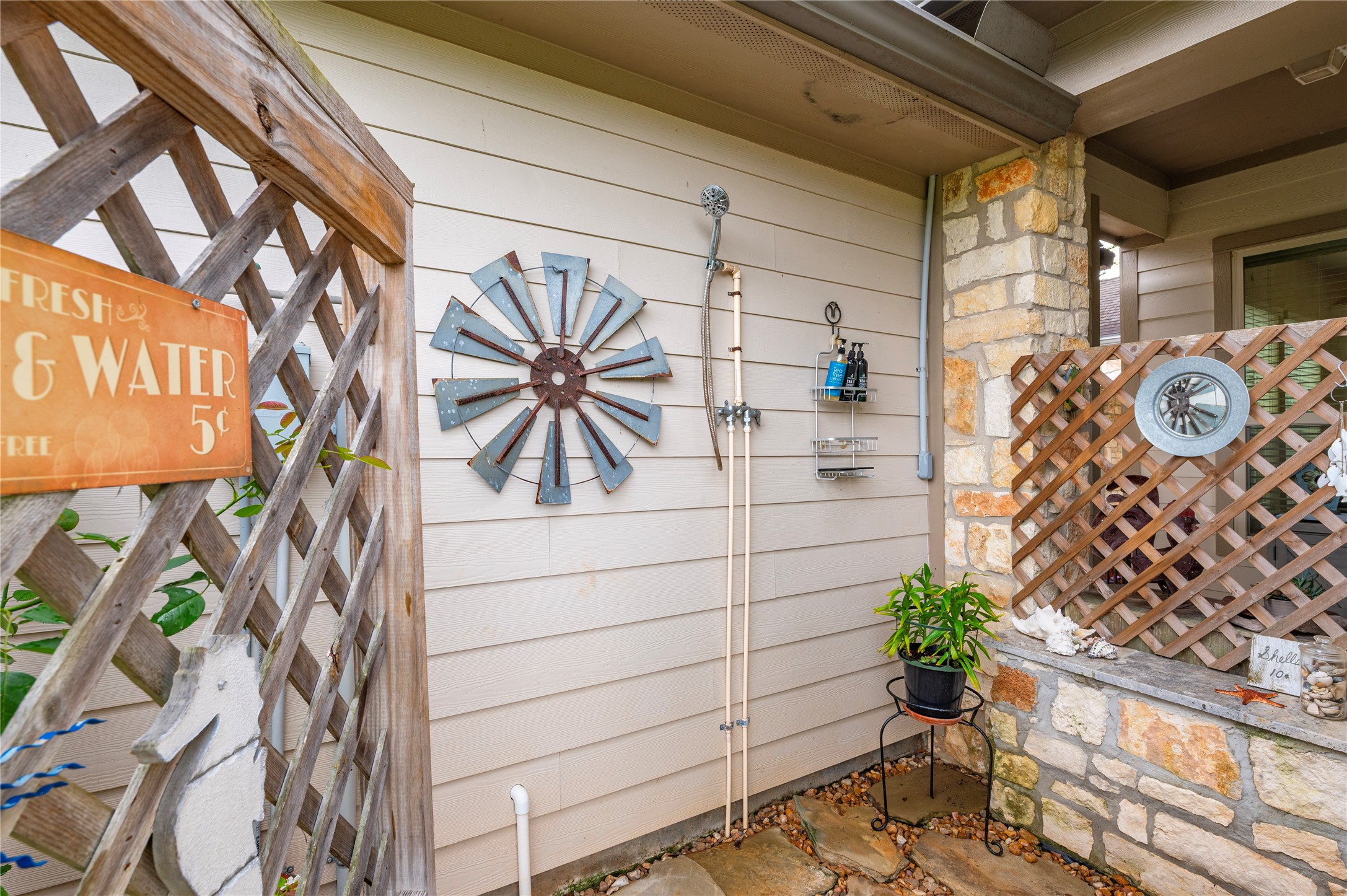 17126 Hamill Drive Rosharon, TX 77583 - Photo 45 of 50 Outdoor shower with stone surfacing.
