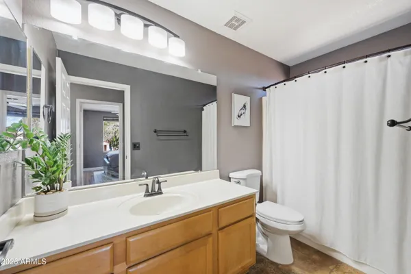 a workspace with furniture and wooden floor