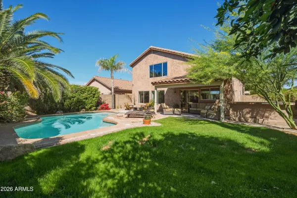 a view of an outdoor sitting area with furniture