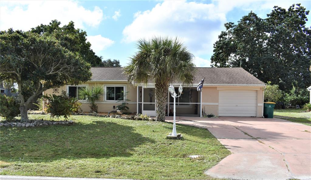 1613 Alton Road Port Charlotte, FL 33952 - Photo 1 of 1 Front