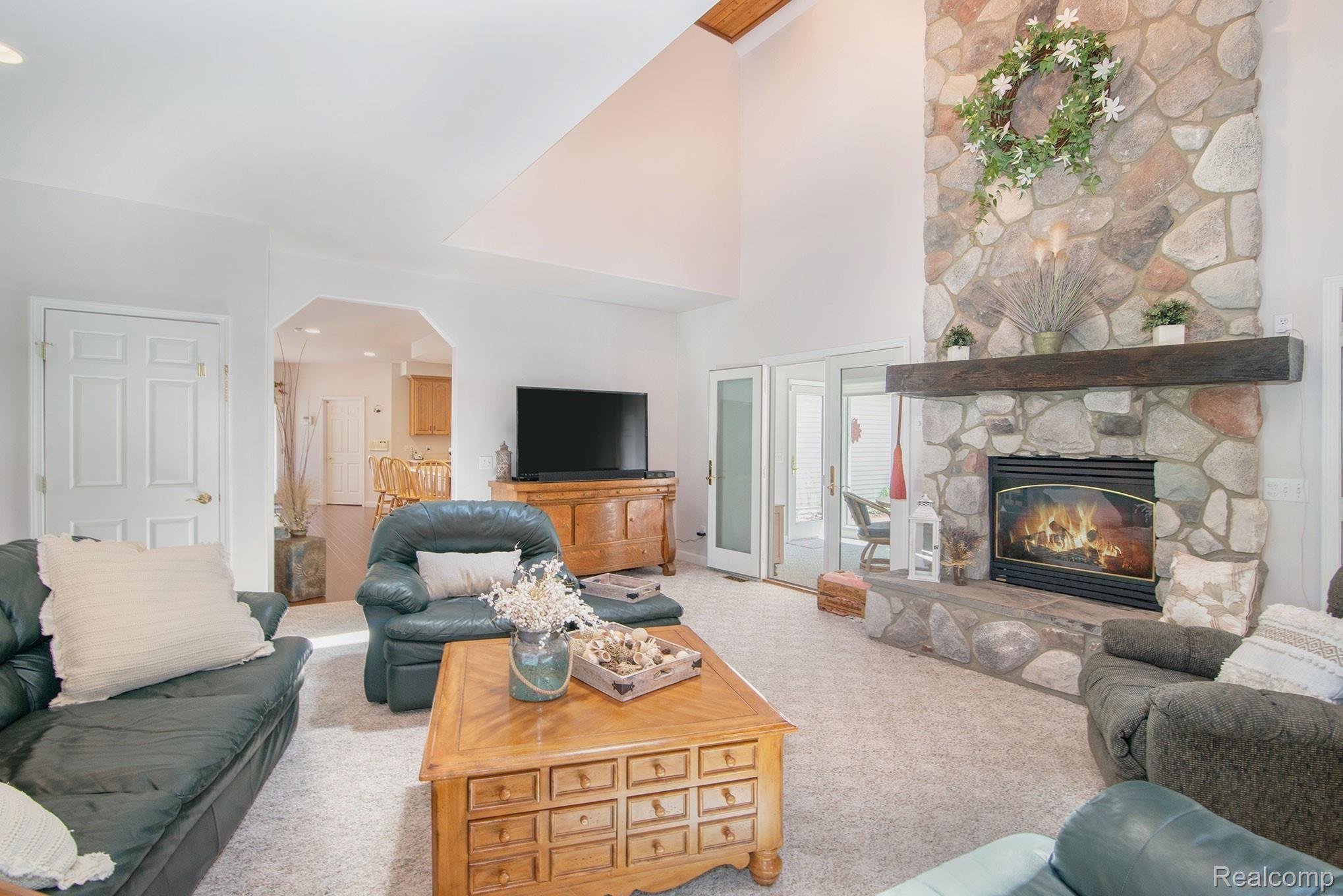 2279 Sundance Ridge Howell, MI 48843 - Photo 4 of 41 Soaring Stone gas Fireplace