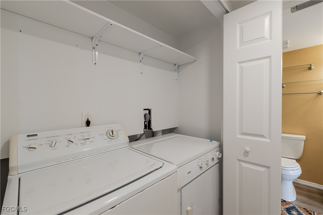 2875 Palm Beach Boulevard, Unit 607 Fort Myers, FL 33916 - Photo 18 of 35 a utility room with dryer and washer