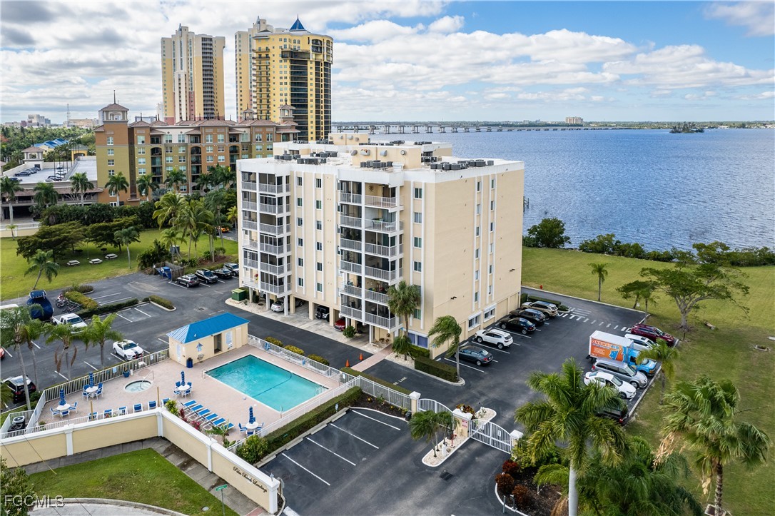2875 Palm Beach Boulevard, Unit 607 Fort Myers, FL 33916 - Photo 2 of 35 a view of a city with tall buildings