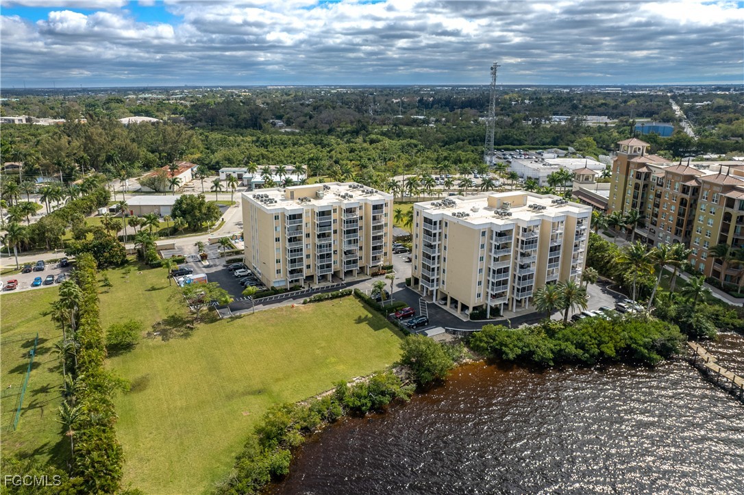 2875 Palm Beach Boulevard, Unit 607 Fort Myers, FL 33916 - Photo 32 of 35 a view of building with outdoor space