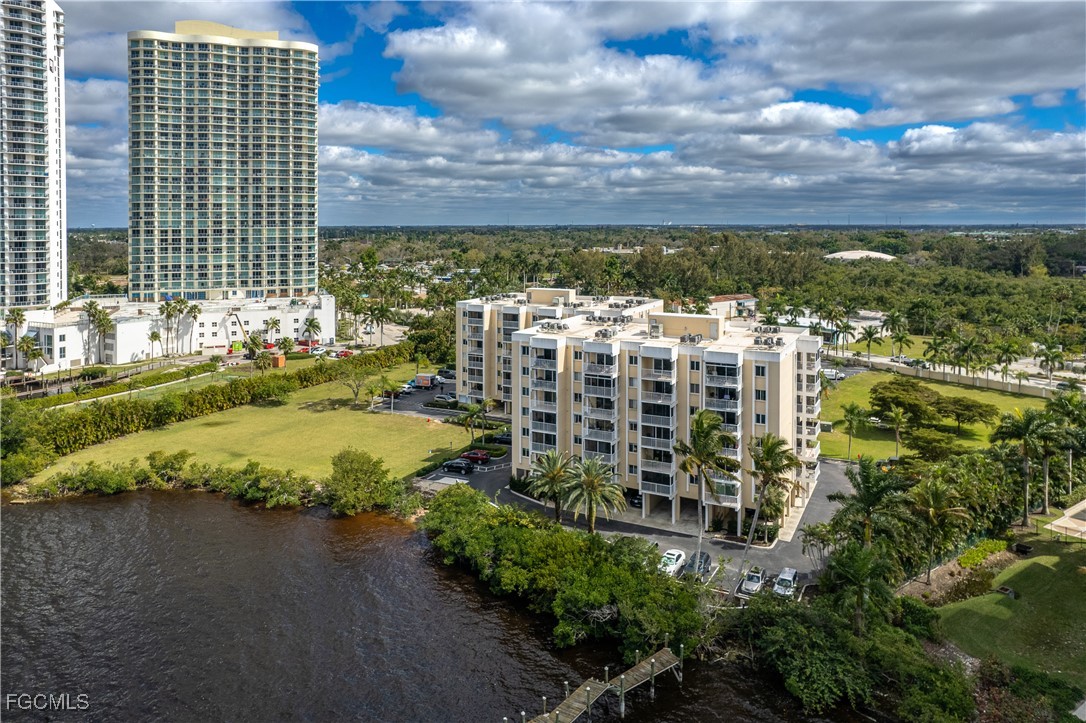 2875 Palm Beach Boulevard, Unit 607 Fort Myers, FL 33916 - Photo 34 of 35 a view of a balcony with a yard