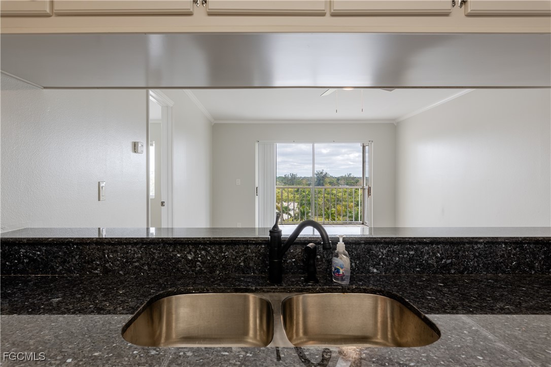 2875 Palm Beach Boulevard, Unit 607 Fort Myers, FL 33916 - Photo 8 of 35 a bathroom with sink and window