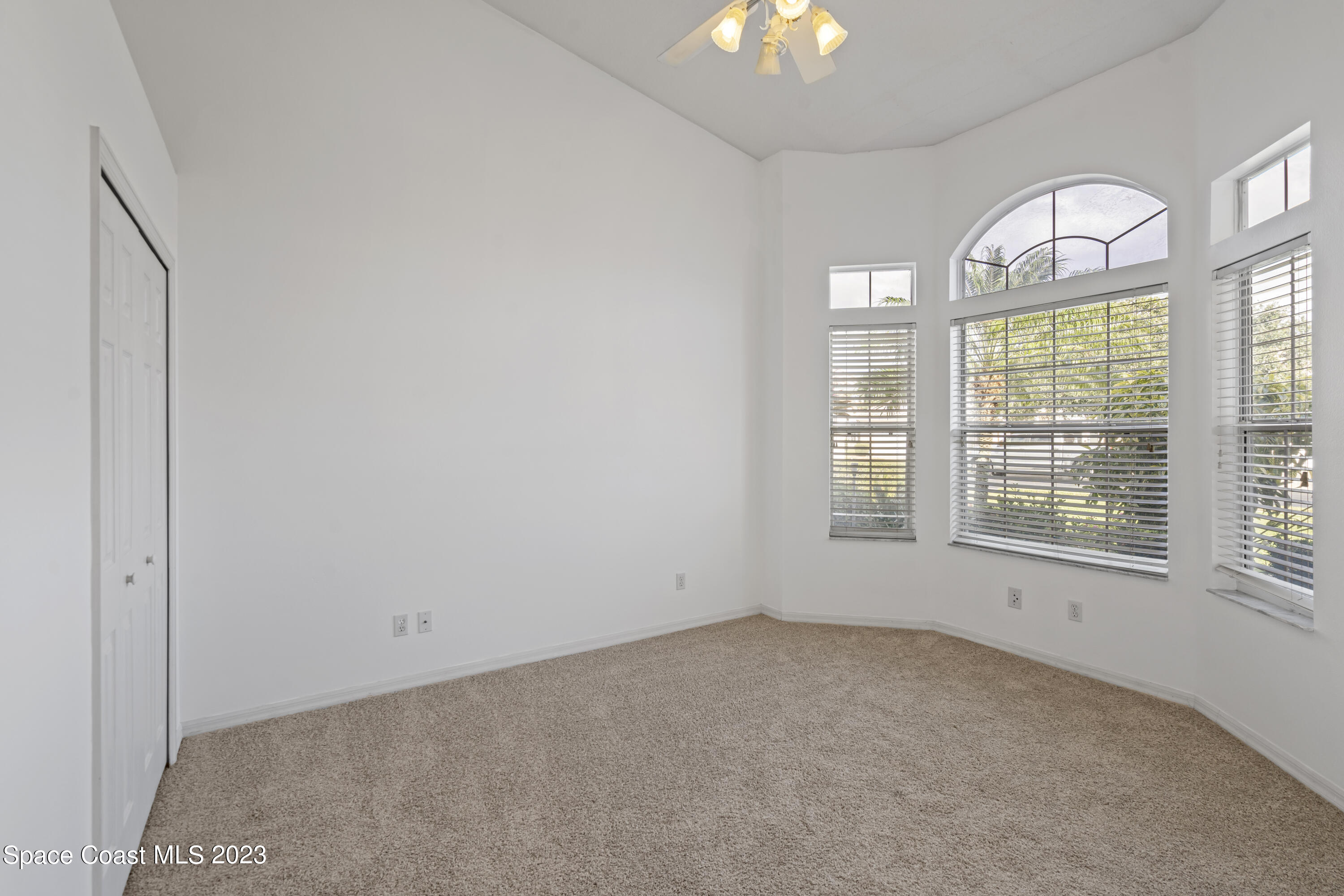 448 Renaissance Avenue Melbourne, FL 32940 - Photo 11 of 57 an empty room with a window