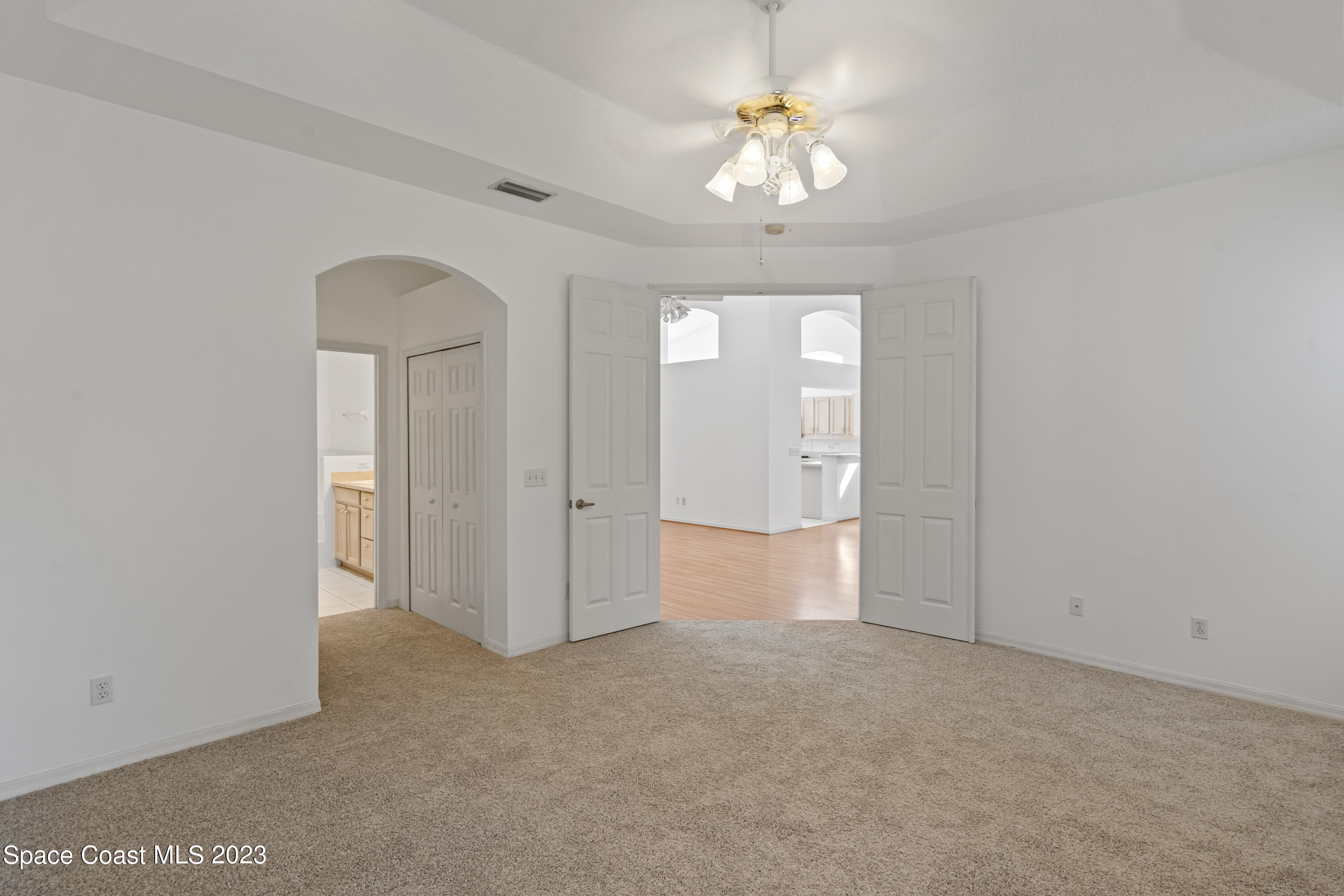 448 Renaissance Avenue Melbourne, FL 32940 - Photo 26 of 57 wooden floor in an empty room