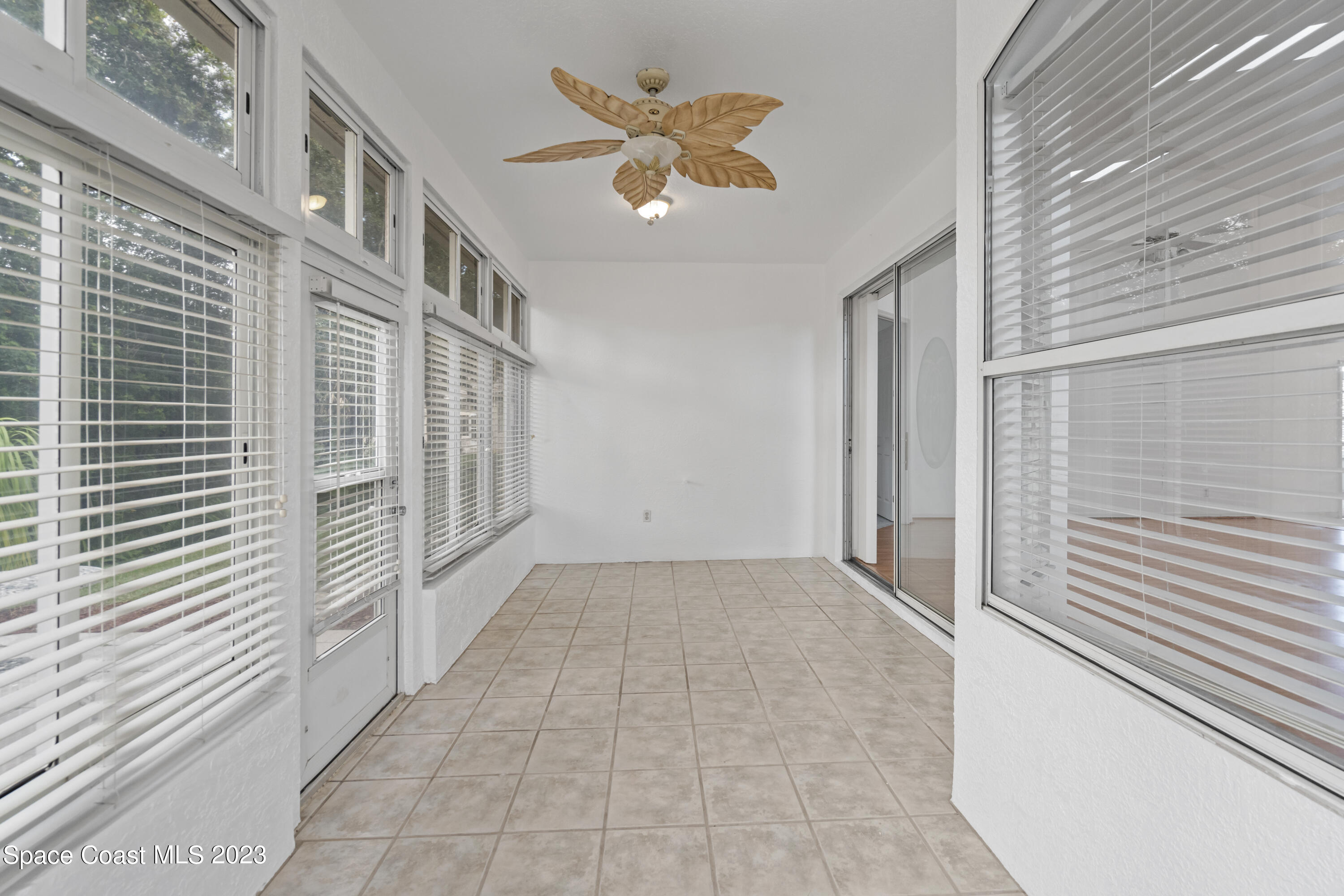 448 Renaissance Avenue Melbourne, FL 32940 - Photo 42 of 57 a view of a house with a ceiling fan