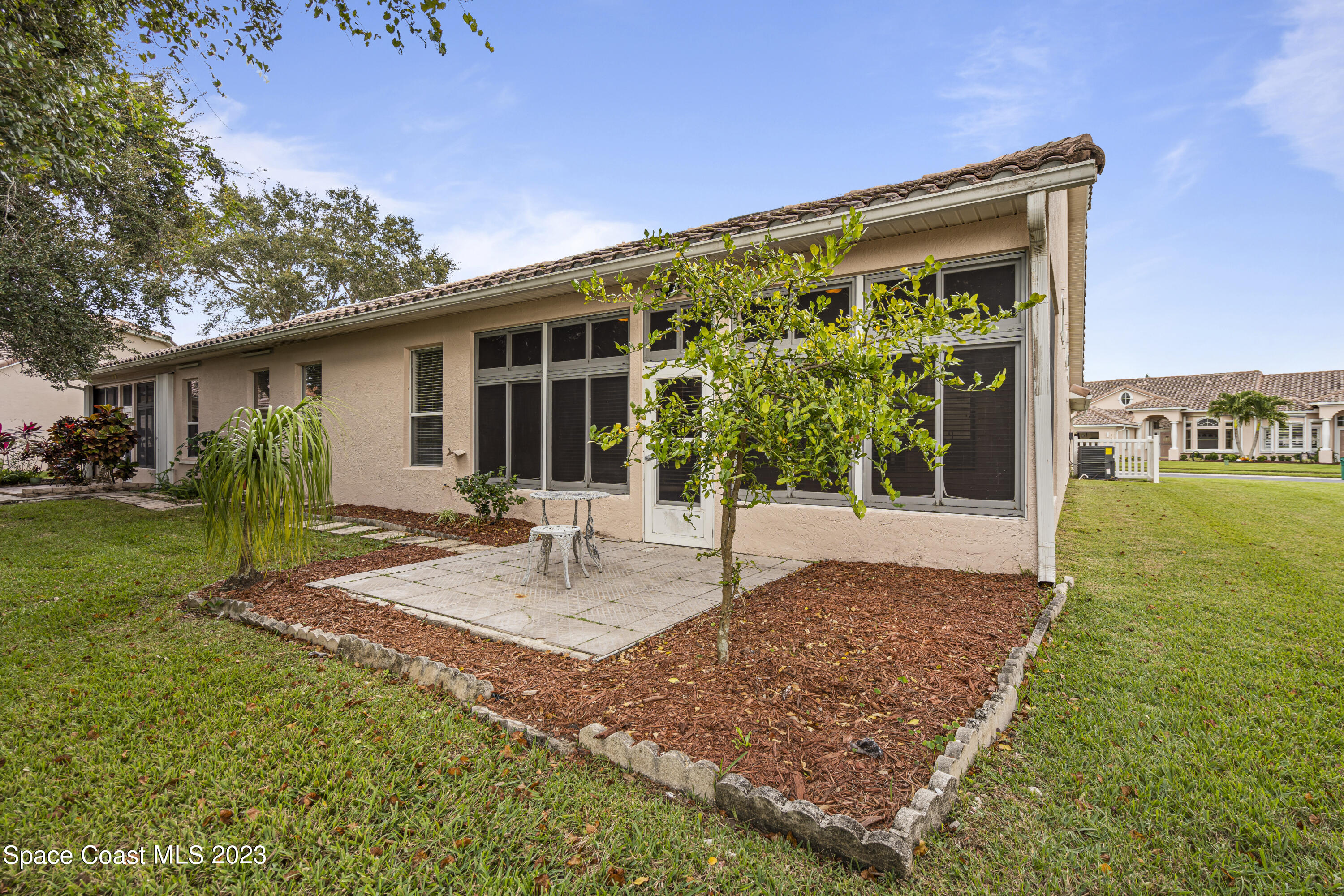 448 Renaissance Avenue Melbourne, FL 32940 - Photo 43 of 57 a view of a house with backyard and porch