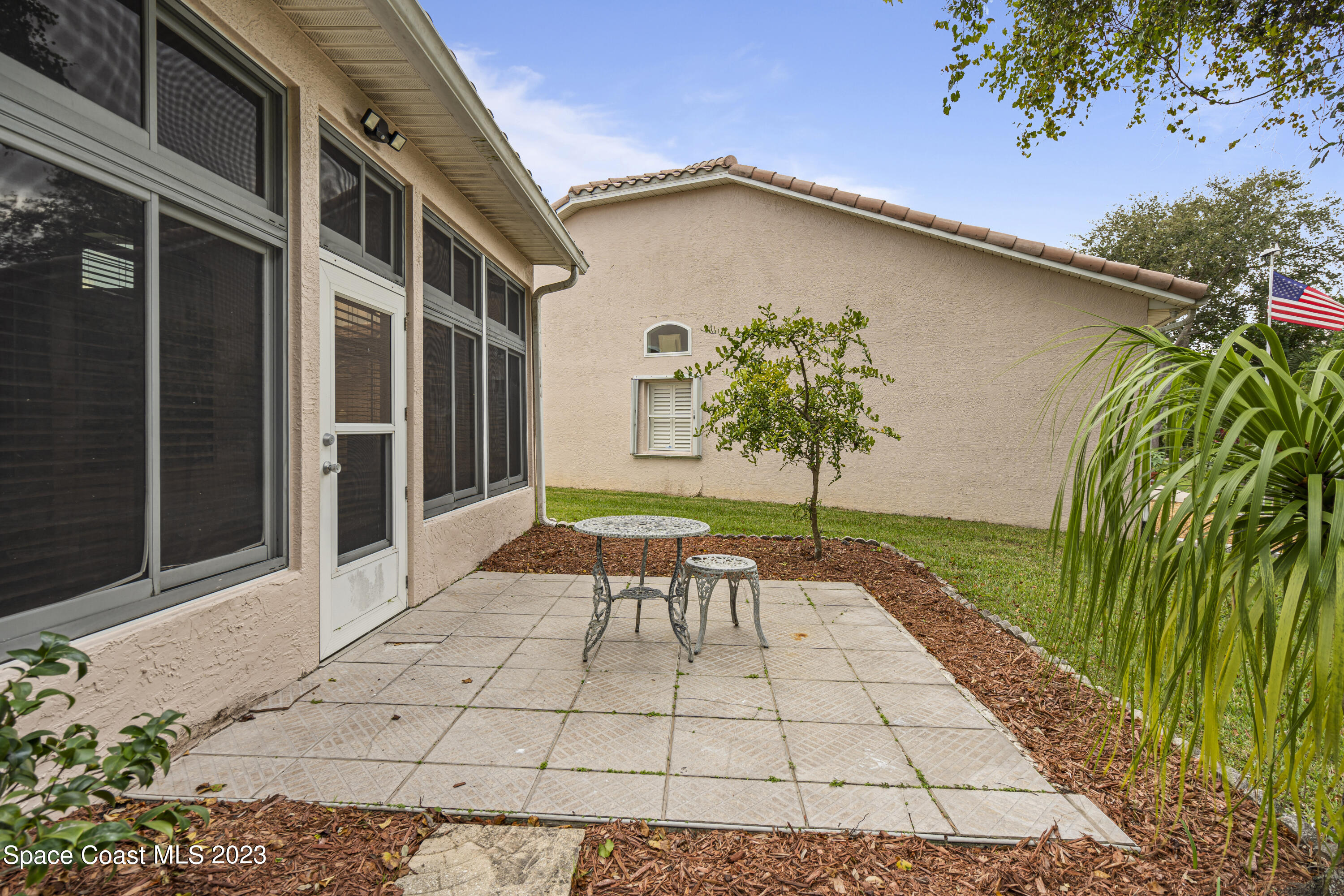 448 Renaissance Avenue Melbourne, FL 32940 - Photo 46 of 57 a view of an outdoor space with porch