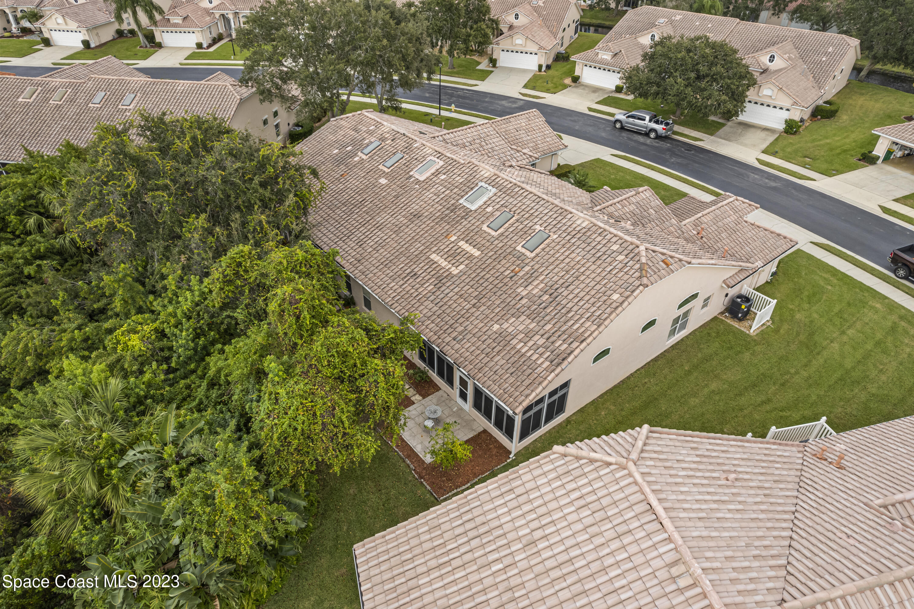 448 Renaissance Avenue Melbourne, FL 32940 - Photo 53 of 57 a view of a house with a yard