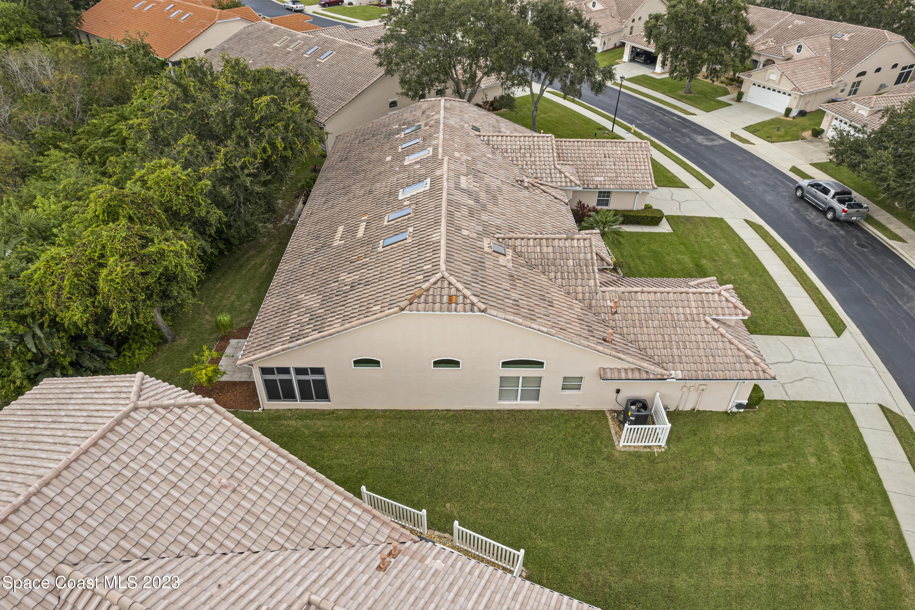 448 Renaissance Avenue Melbourne, FL 32940 - Photo 54 of 57 an aerial view of a house with a yard