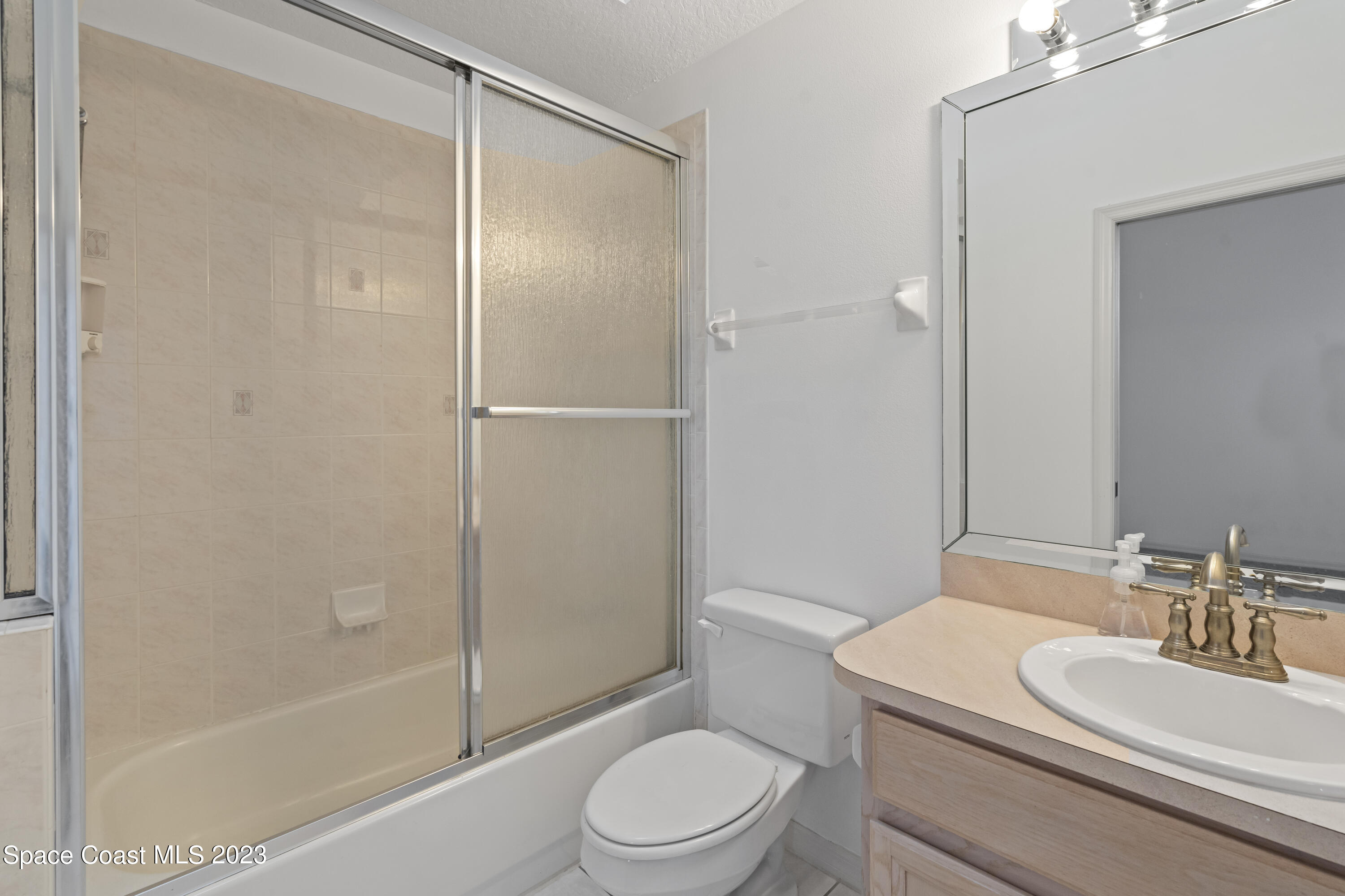 448 Renaissance Avenue Melbourne, FL 32940 - Photo 8 of 57 a bathroom with a sink toilet and shower