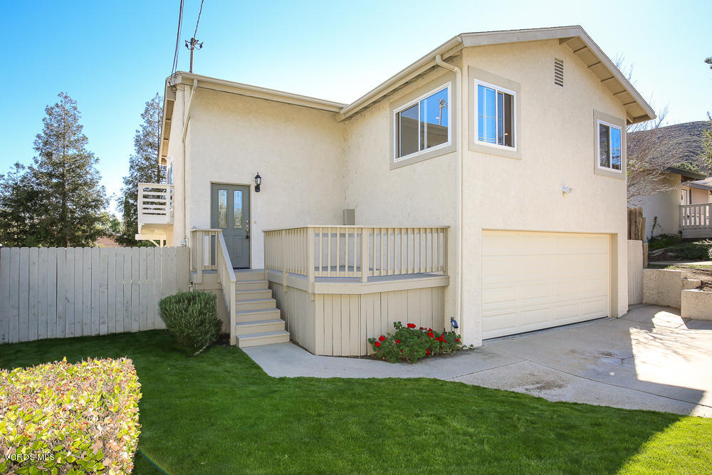 254 Maple Road Newbury Park, CA 91320 - Photo 1 of 24 a front view of a house with garden