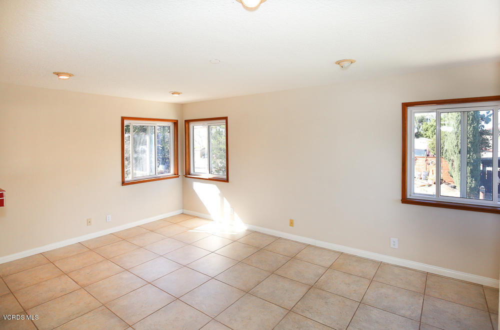 254 Maple Road Newbury Park, CA 91320 - Photo 11 of 24 a view of an empty room with window