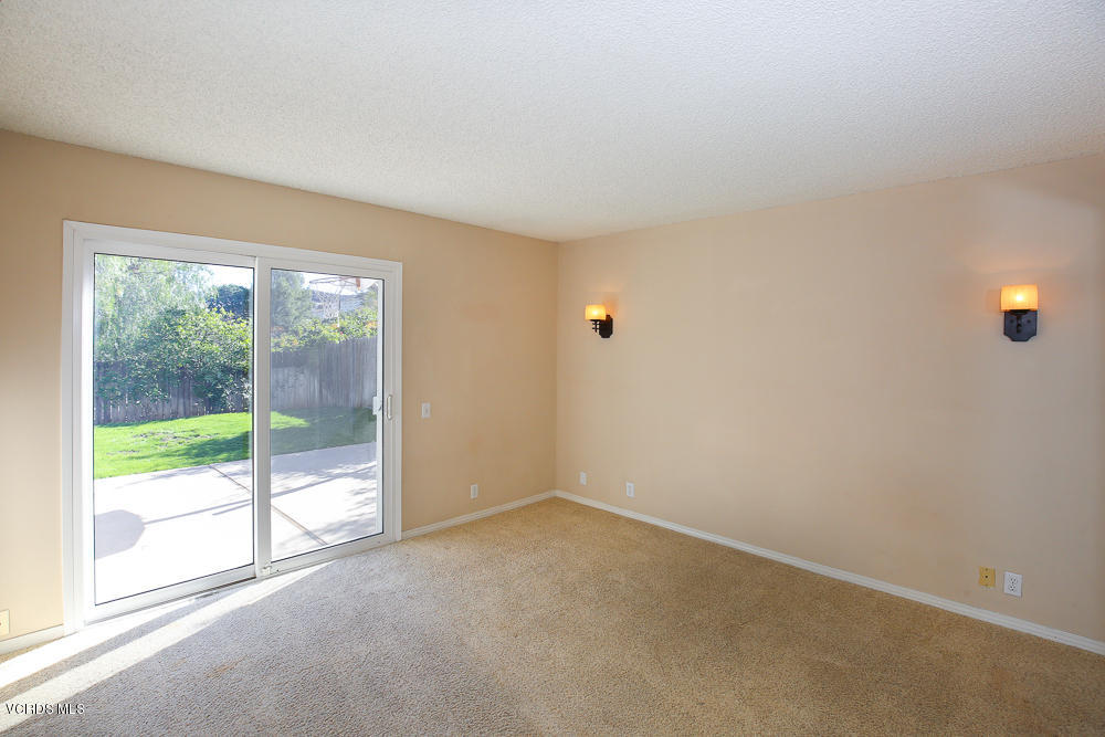 254 Maple Road Newbury Park, CA 91320 - Photo 16 of 24 a view of an empty room with wooden floor and a window
