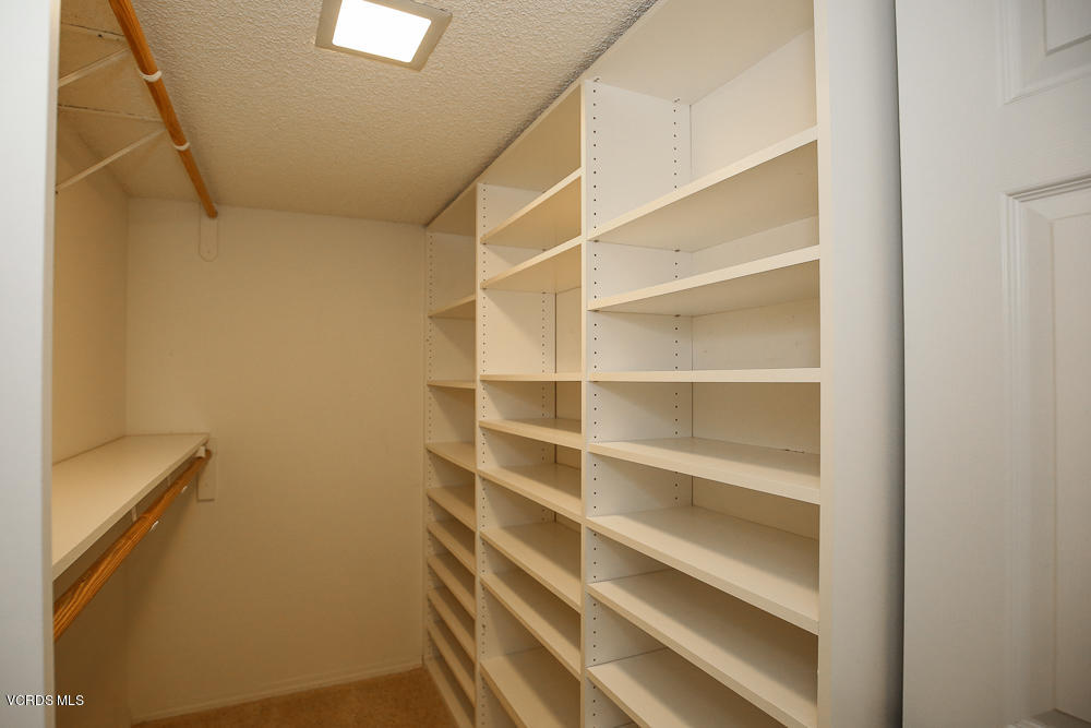 254 Maple Road Newbury Park, CA 91320 - Photo 17 of 24 a view of walk in closet with empty racks