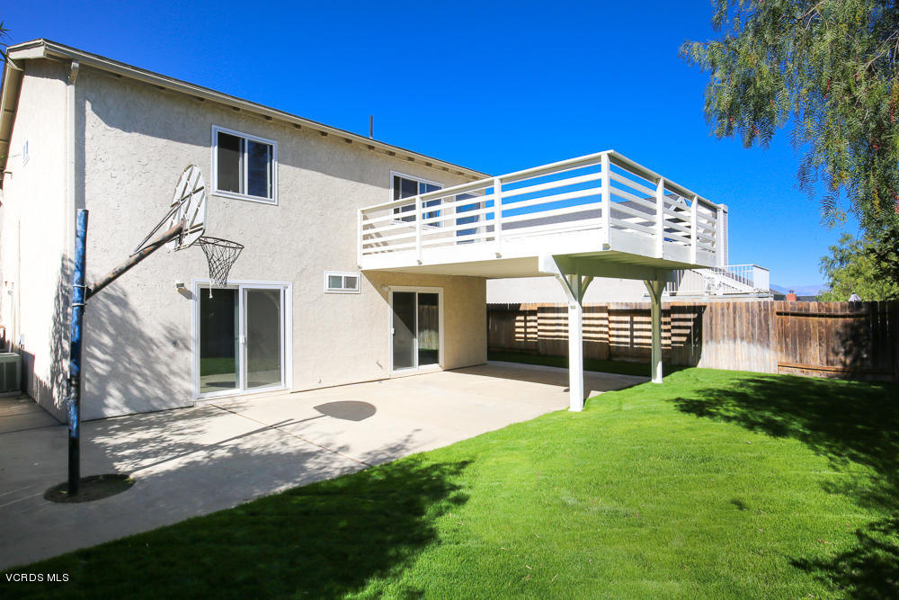 254 Maple Road Newbury Park, CA 91320 - Photo 20 of 24 a view of a house with a yard and sitting area