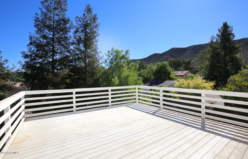 254 Maple Road Newbury Park, CA 91320 - Photo 22 of 24 a view of a terrace with trees