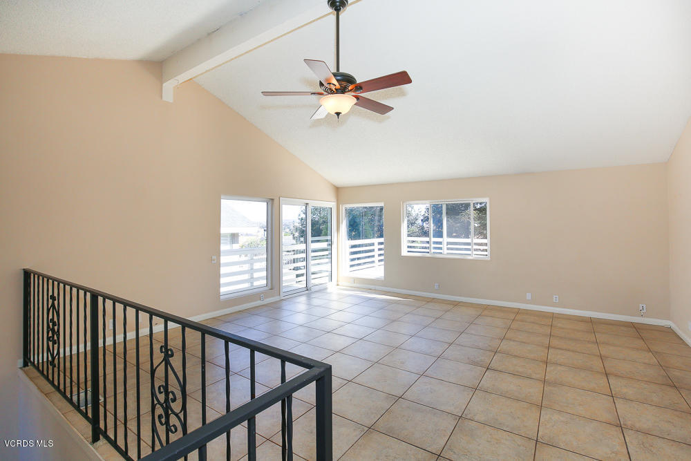 254 Maple Road Newbury Park, CA 91320 - Photo 5 of 24 a view of a livingroom with a ceiling fan and window