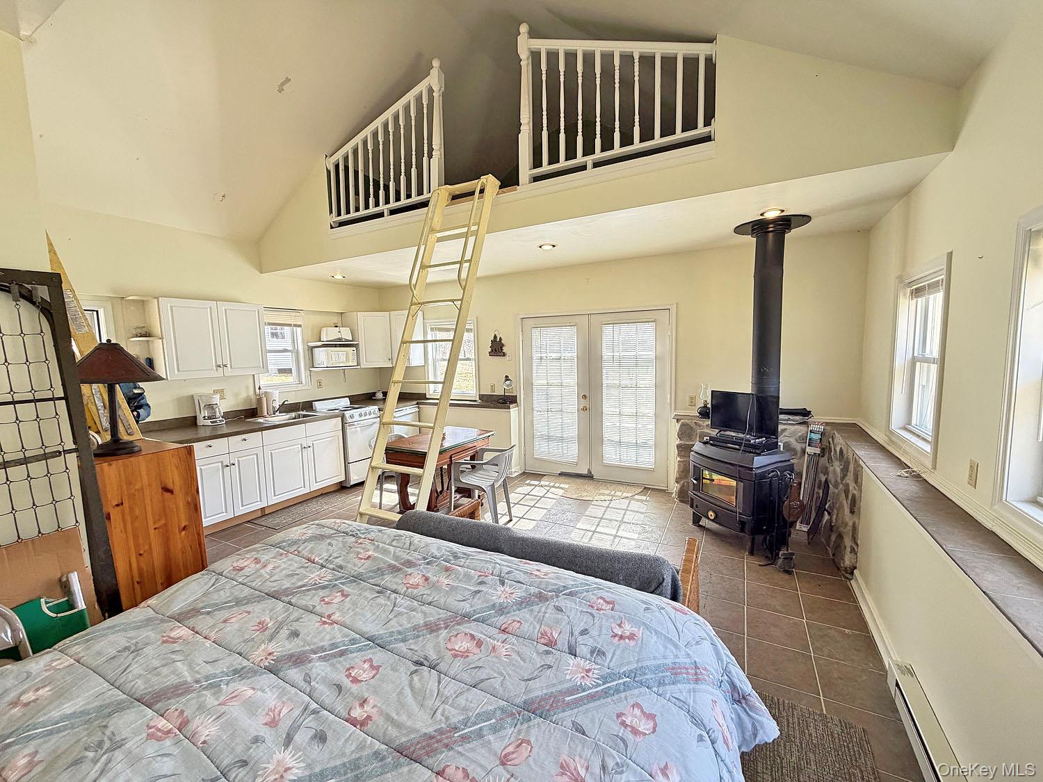 860 River Road Callicoon, NY 12723 - Photo 14 of 27 Sleeping area facing living area.
