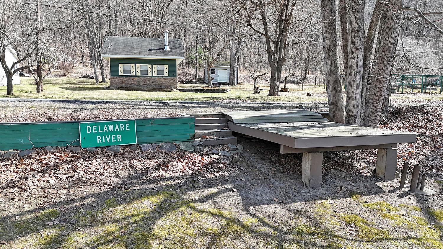 860 River Road Callicoon, NY 12723 - Photo 2 of 27 Deck on the riverbank.