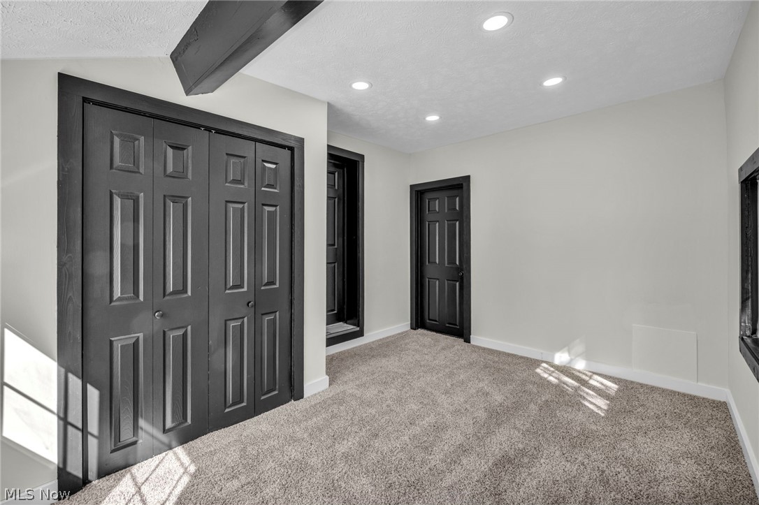 7339 River Road Olmsted Falls, OH 44138 - Photo 21 of 45 Carpeted interior space featuring white walls and recessed ceiling lighting