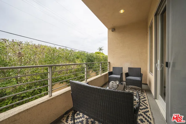 a view of a balcony with a couch