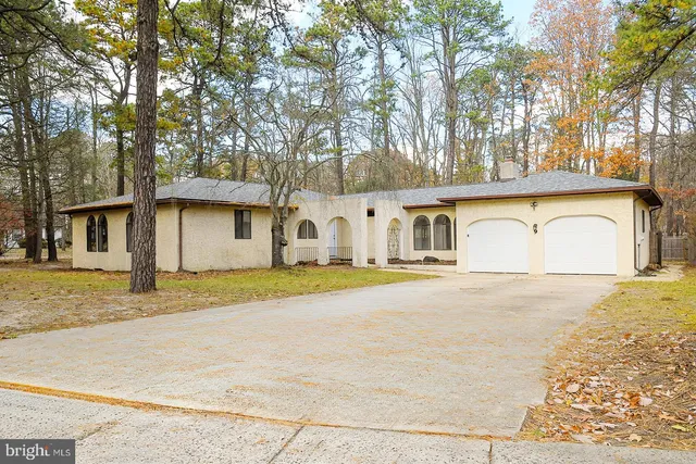 a house view with a outdoor space