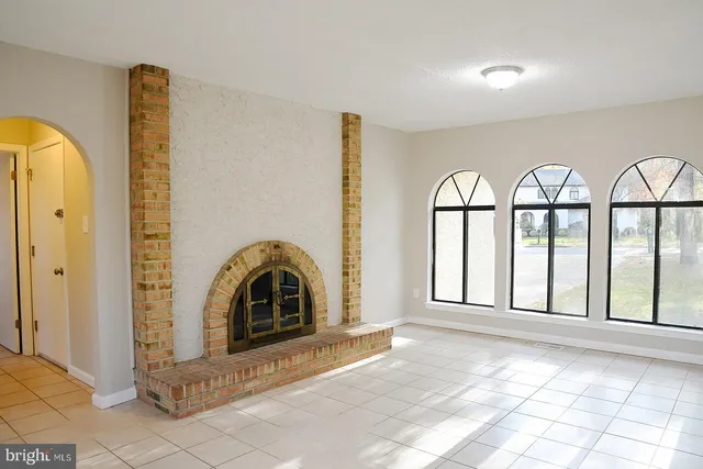 an empty room that has a window