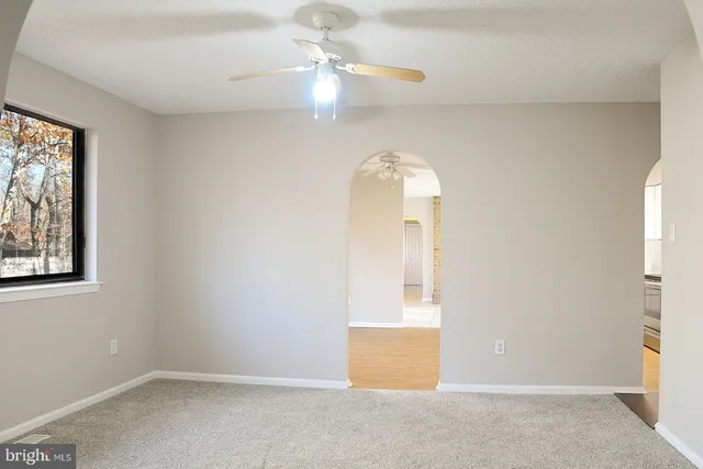 a view of a room with drop ceiling