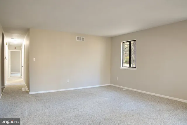 an empty room with a window