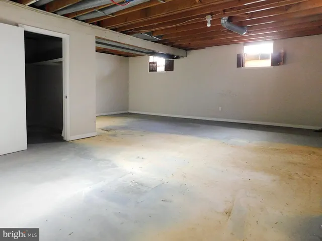 a house with trees in the background