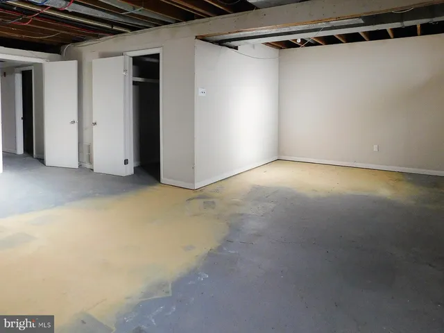 a house with trees in the background