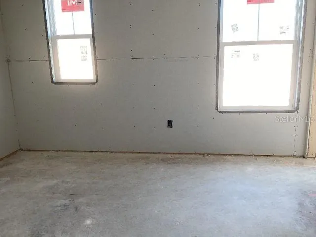 an empty room with a window