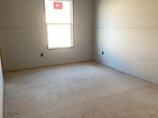 an empty room with a window