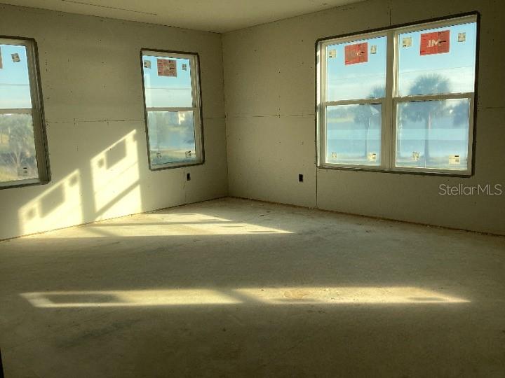 1219 Bluewater Lane Rockledge, FL 32955 - Photo 18 of 29 a view of an empty room with a window