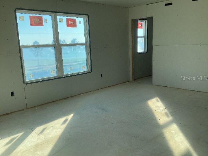 1219 Bluewater Lane Rockledge, FL 32955 - Photo 19 of 29 a view of an empty room with a window