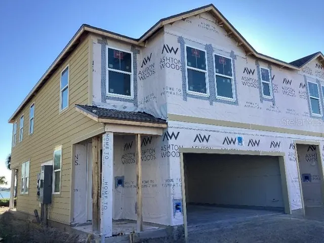 a front view of a house with a balcony