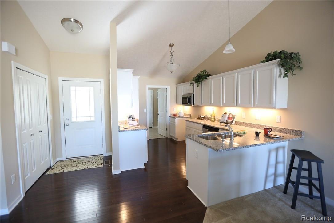 481 Hosta, Unit 85 Howell, MI 48843 - Photo 3 of 23 Please note, pictures are from a different condominium with identical floor plan!