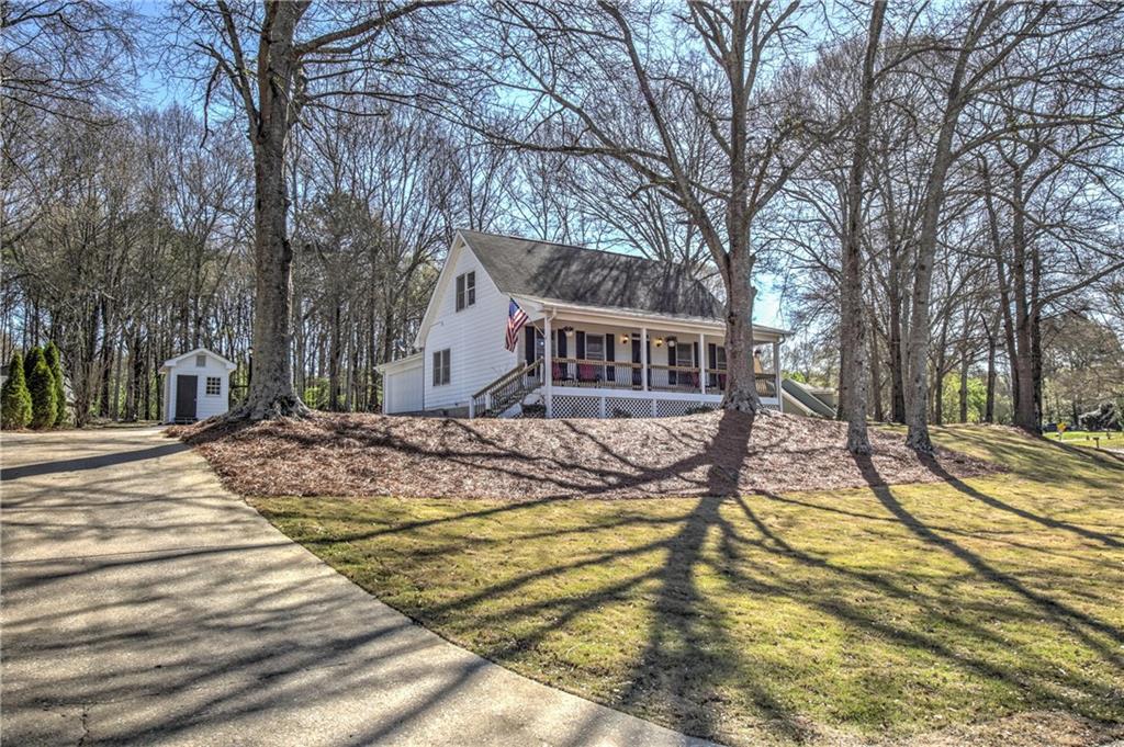 233 Ryan Road Winder, GA 30680 - Photo 1 of 1 a view of a house with snow on the roof
