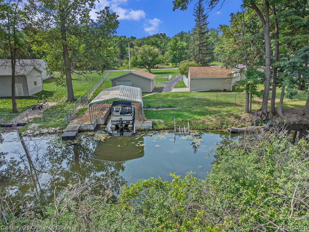 10228 Rexford Road Grass Lake, MI 49240 - Photo 3 of 24 Dock with a water view