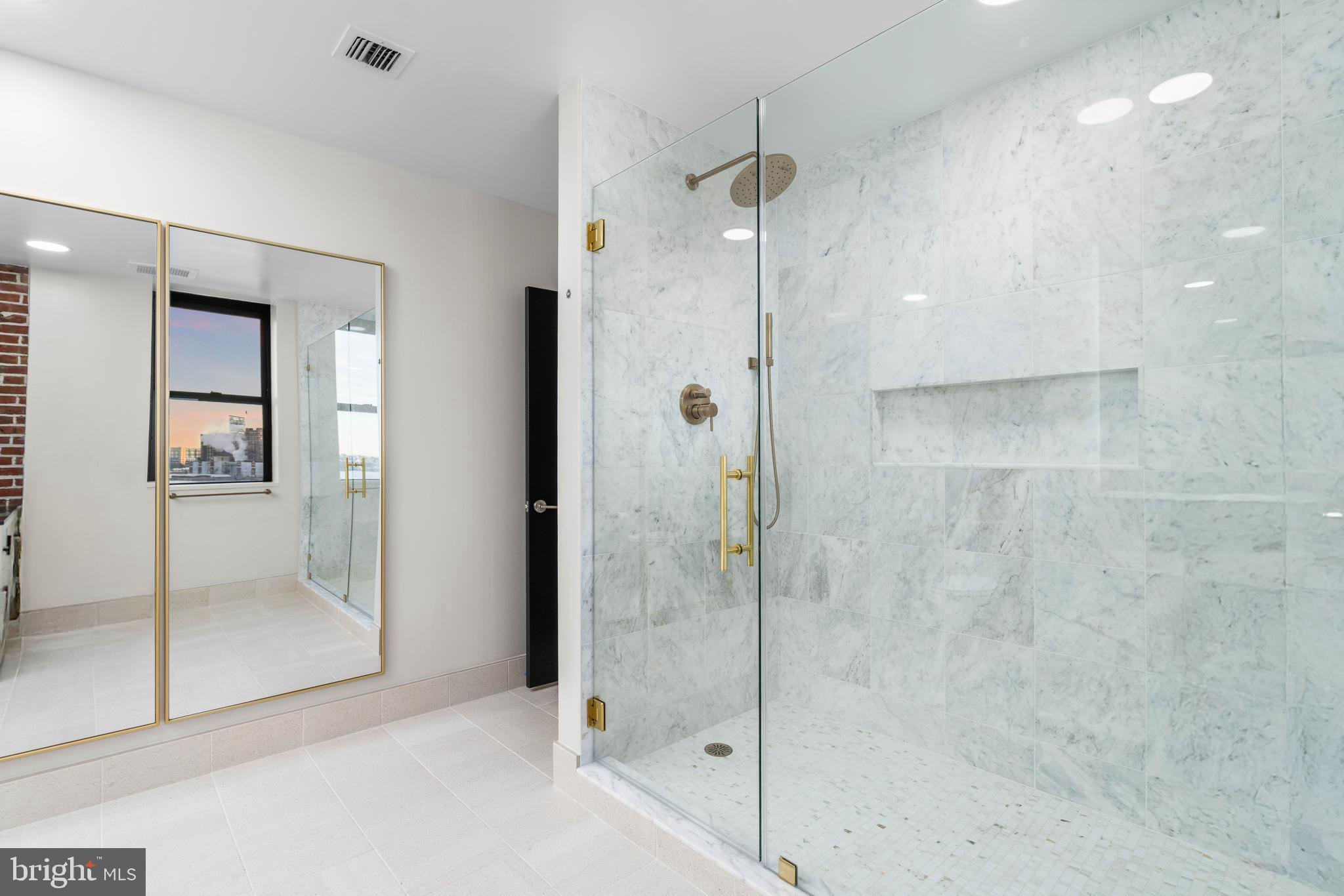 1000 Fell Street, Unit 646 Baltimore, MD 21231 - Photo 18 of 47 a bathroom with a shower