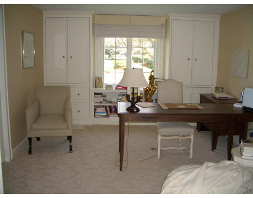 11 Princeton Road Brookline, MA 02467 - Photo 11 of 13 a view of a workspace with furniture and a window